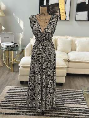 Indulge in Style Black and White Leaf Print Smocked Maxi Dress